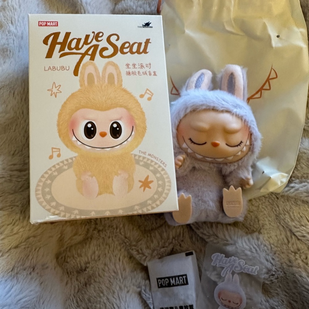 ZIZi- Pop Mart Labubu Have A Seat Figure- New. Box opened to verify.